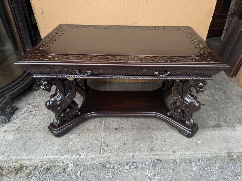 R. J. HORNER CARVED WING GRIFFIN LIBRARY TABLE