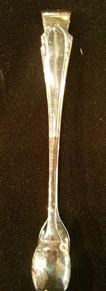 Silver spoon tongs