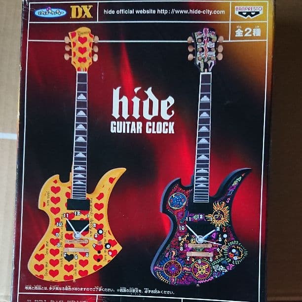 hide guitar shaped wall clock