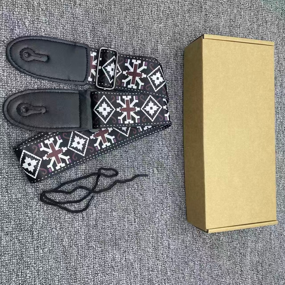 Black checkered pattern guitar strap, highly functional, currently on sale