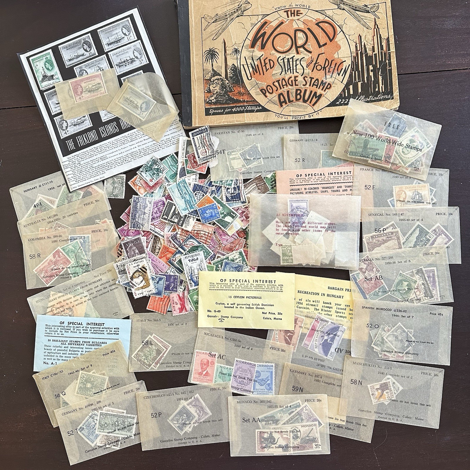 The World United States & Foreign Postage Stamp Album 1938 + Variety Stamp Lot