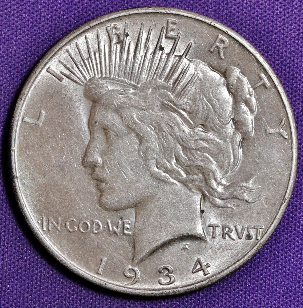 1934-d Peace Silver Dollar.  Error DDO. Dramatic Doubling Top 3 Rays RT.  209256