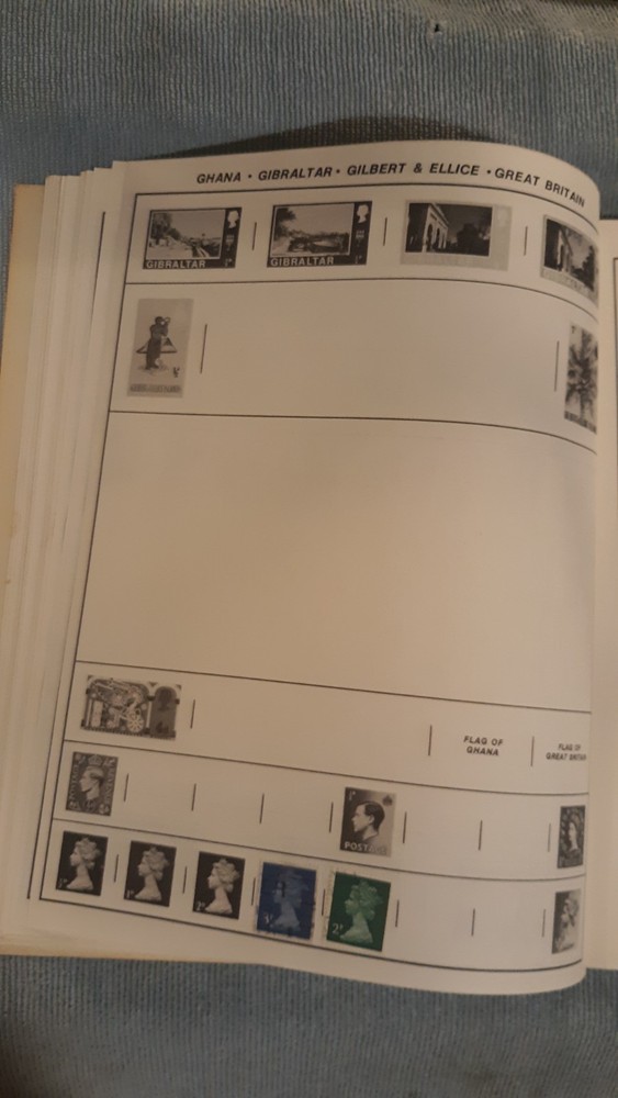 Treat Monarch World Stamp Album Stamp Book With Some Stamps