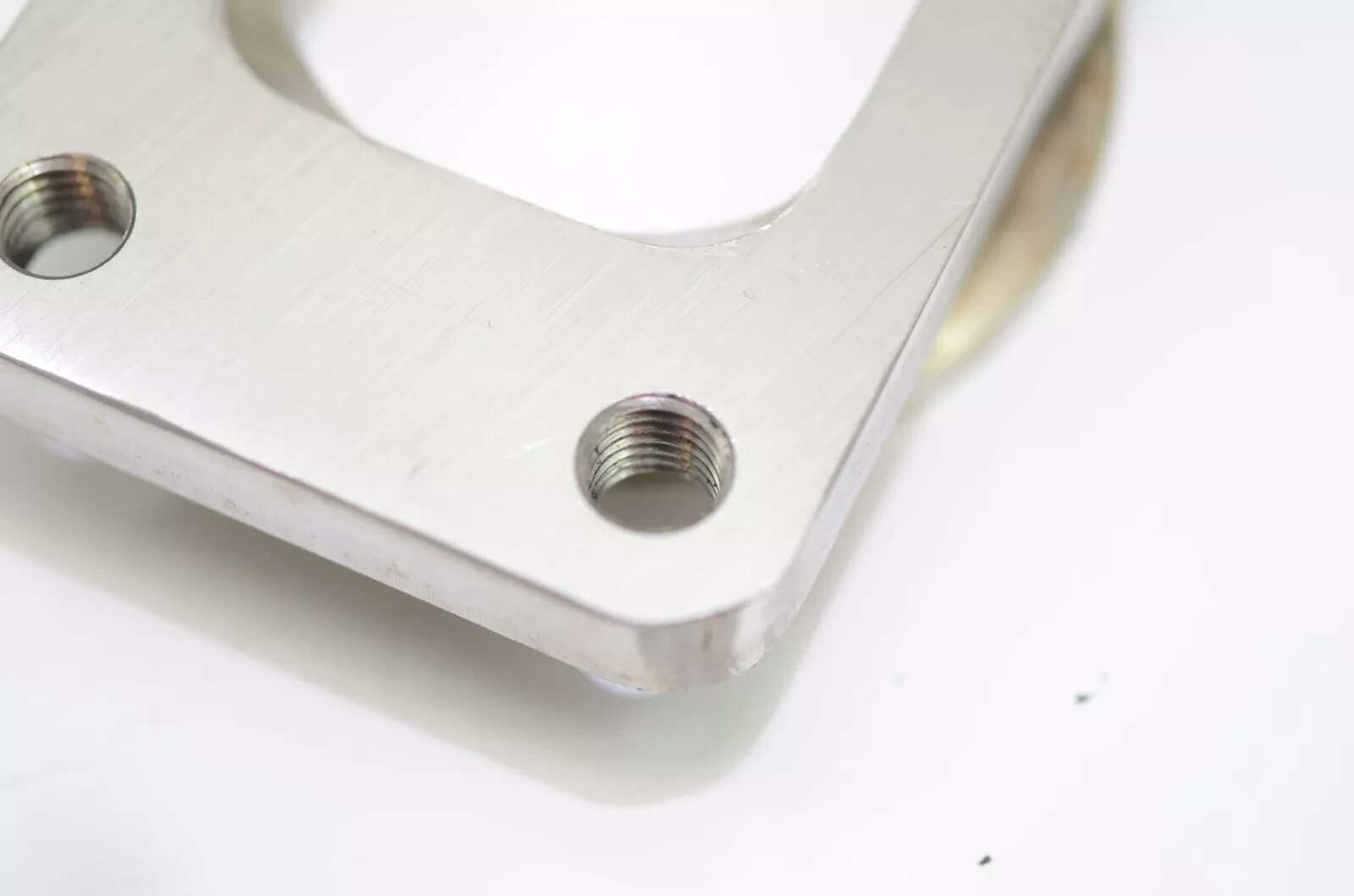 All Out Fab Precision turbo v-band to T3 adapter with hardware and clamp