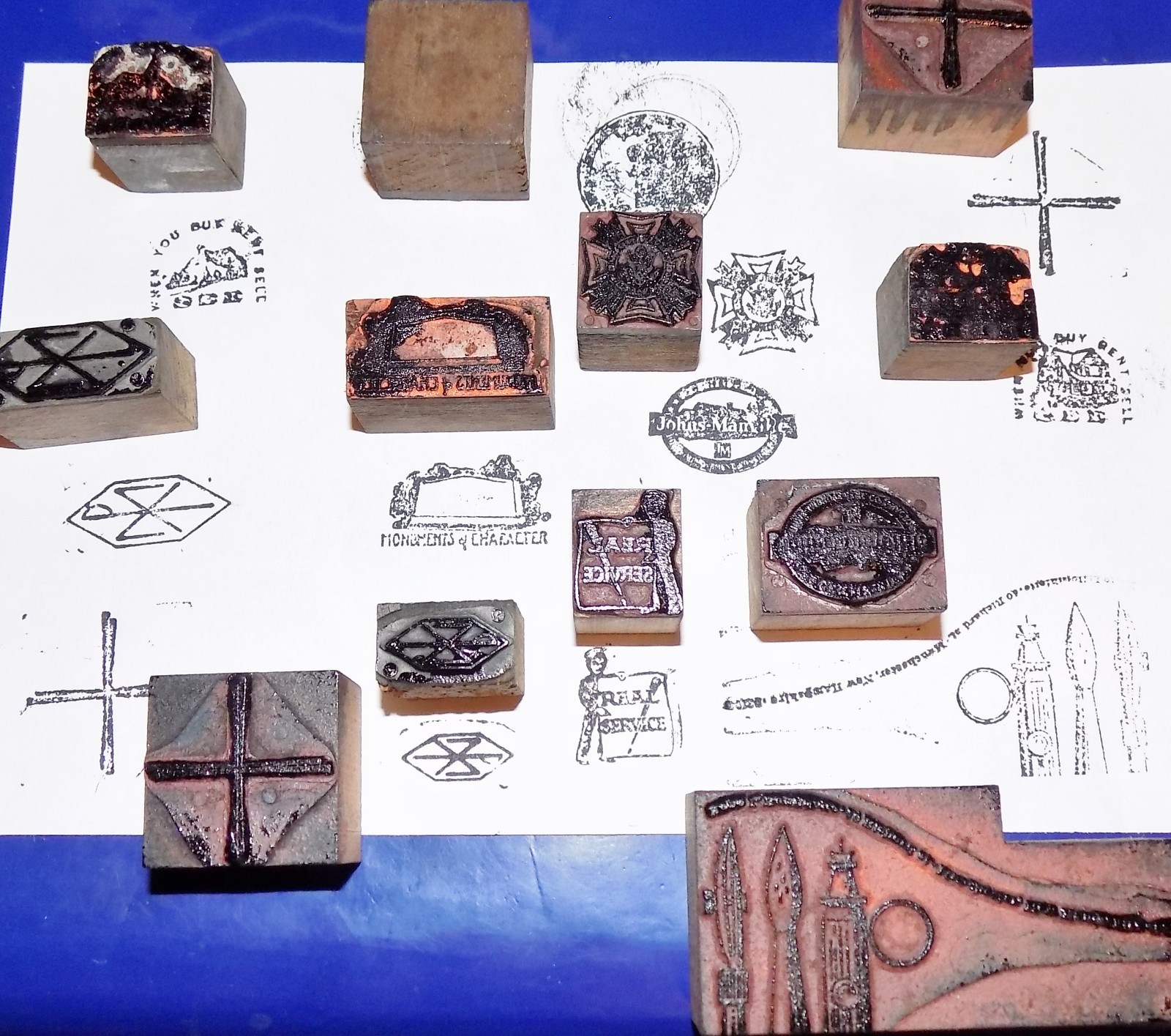 Lot of Twelve Vintage or Antique Wood & Metal Printers Blocks