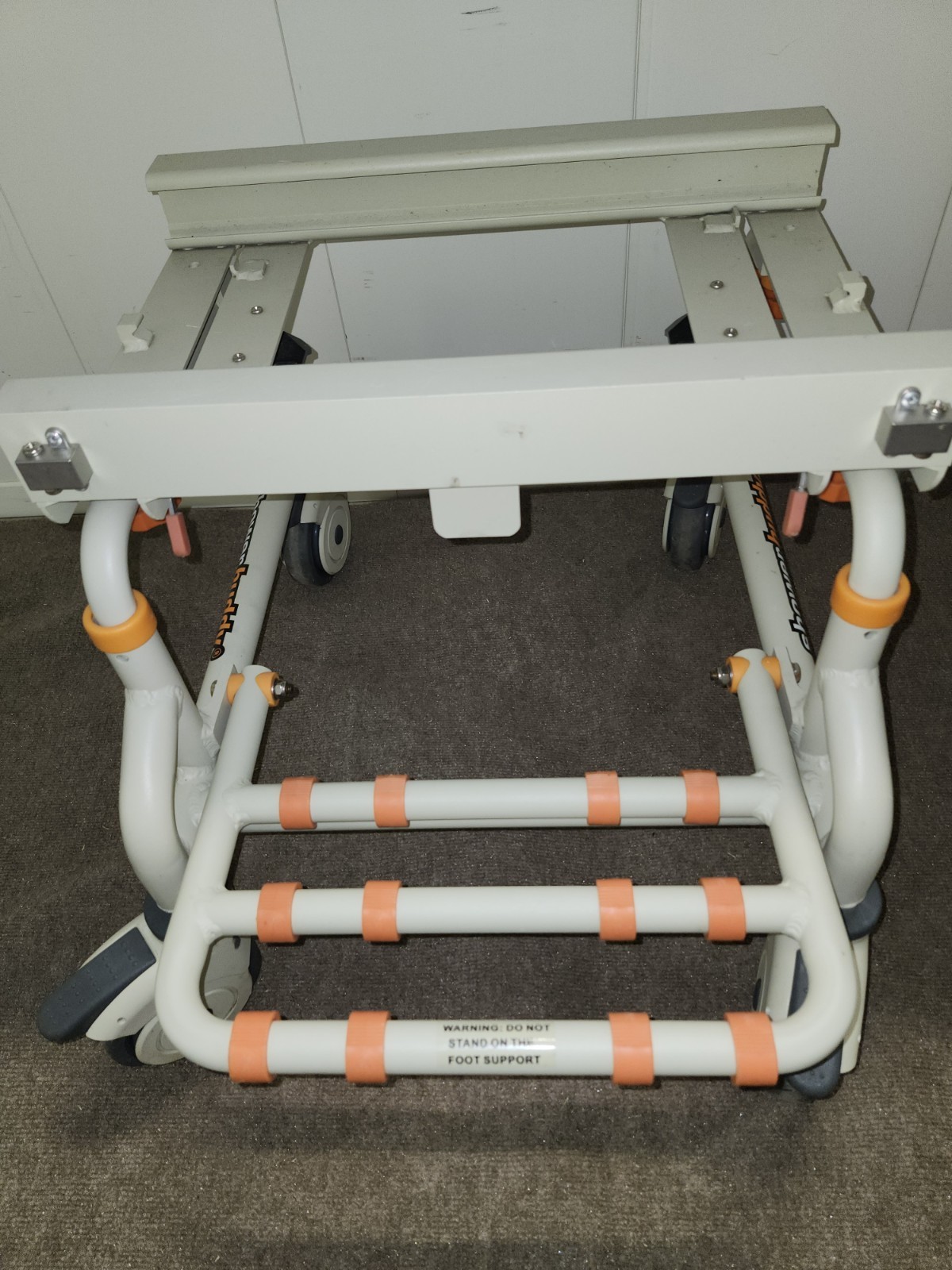 ShowerBuddy New SB2 Rolling Chair Base With Footrest And Locking Casters