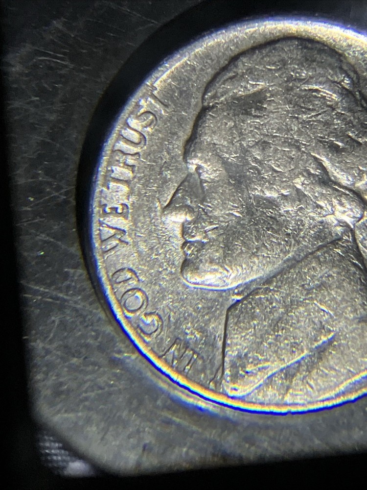 1980 D Nickle Struck Through Grease