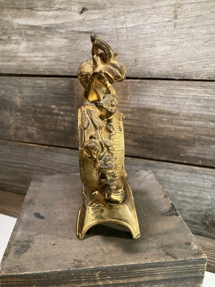 Victorian Cherub Brass Clock Holder Round Face