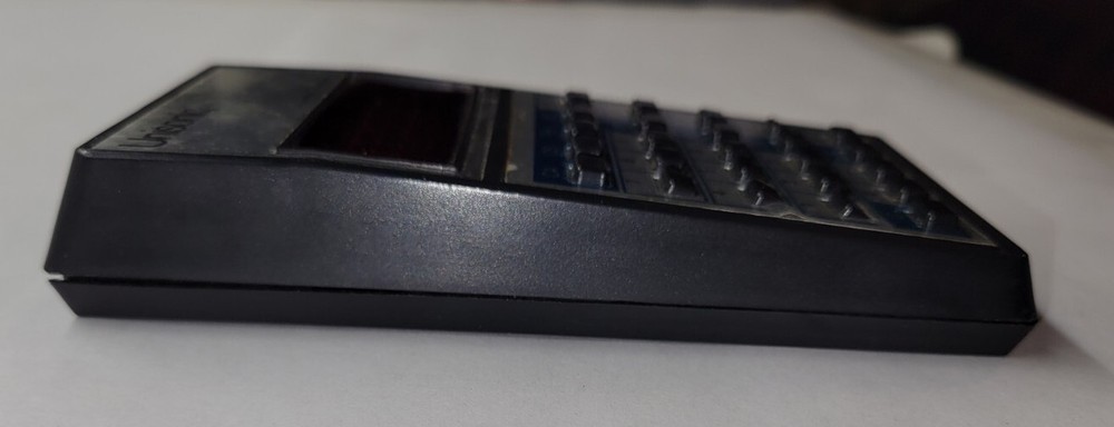 Unisonic Pocket Calculator Model 1541L Chipped Corner. UNTESTED