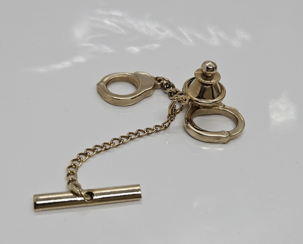 Hand Cuff Gold Tone Lapel Pin
