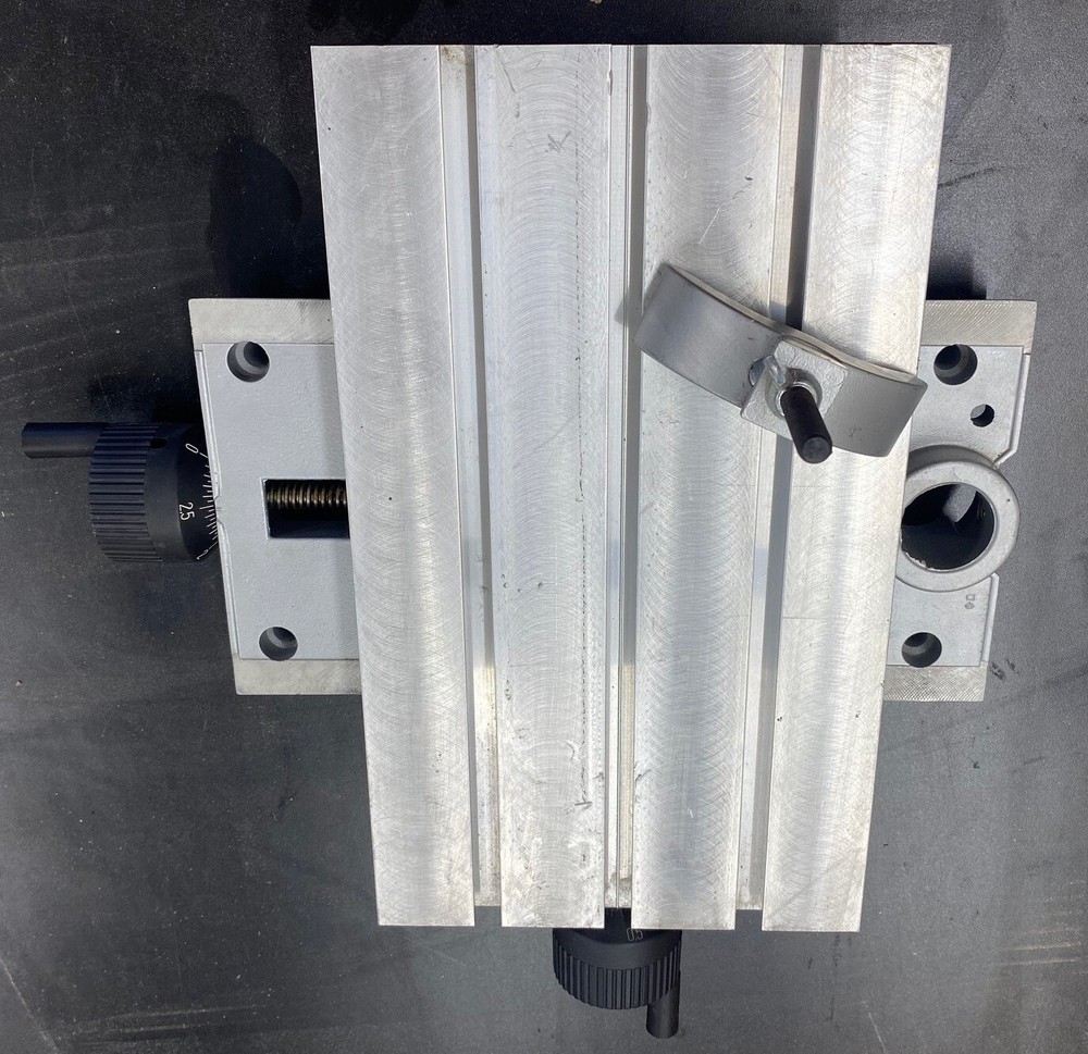 Adjustable Clamp Down Table