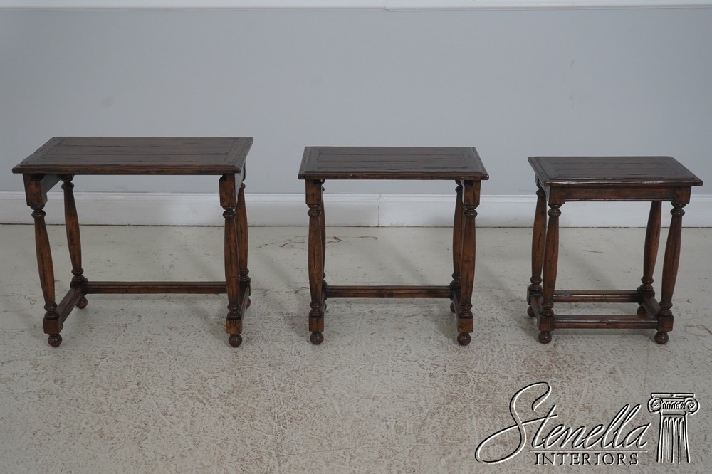 72043: GUY CHADDOCK Jacobean Distressed Oak Nesting Tables