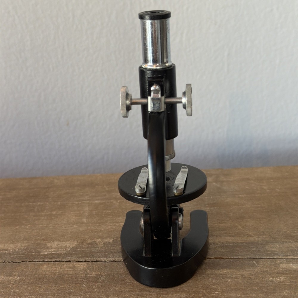 Vintage HIKA 150x Microscope 5in. Includes 3 slides and original box.
