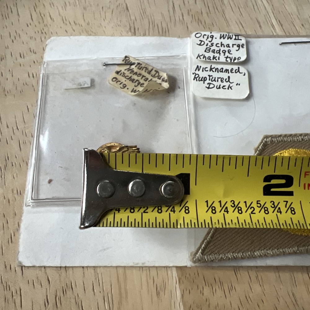 WWII Honorable Discharge Ruptured Duck Patch And Pin