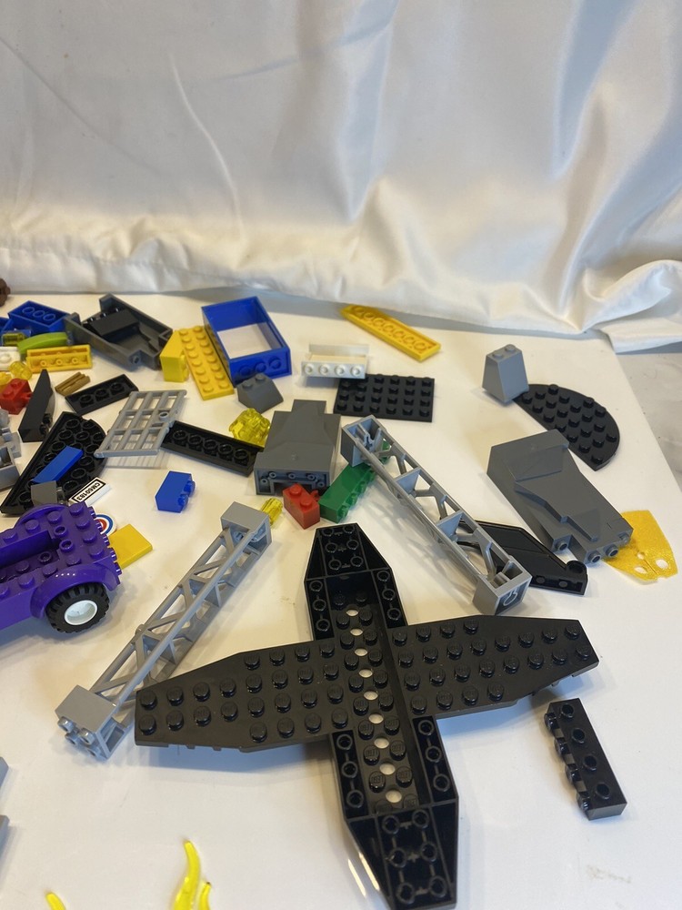 lego blocks and 3 figures with booklet