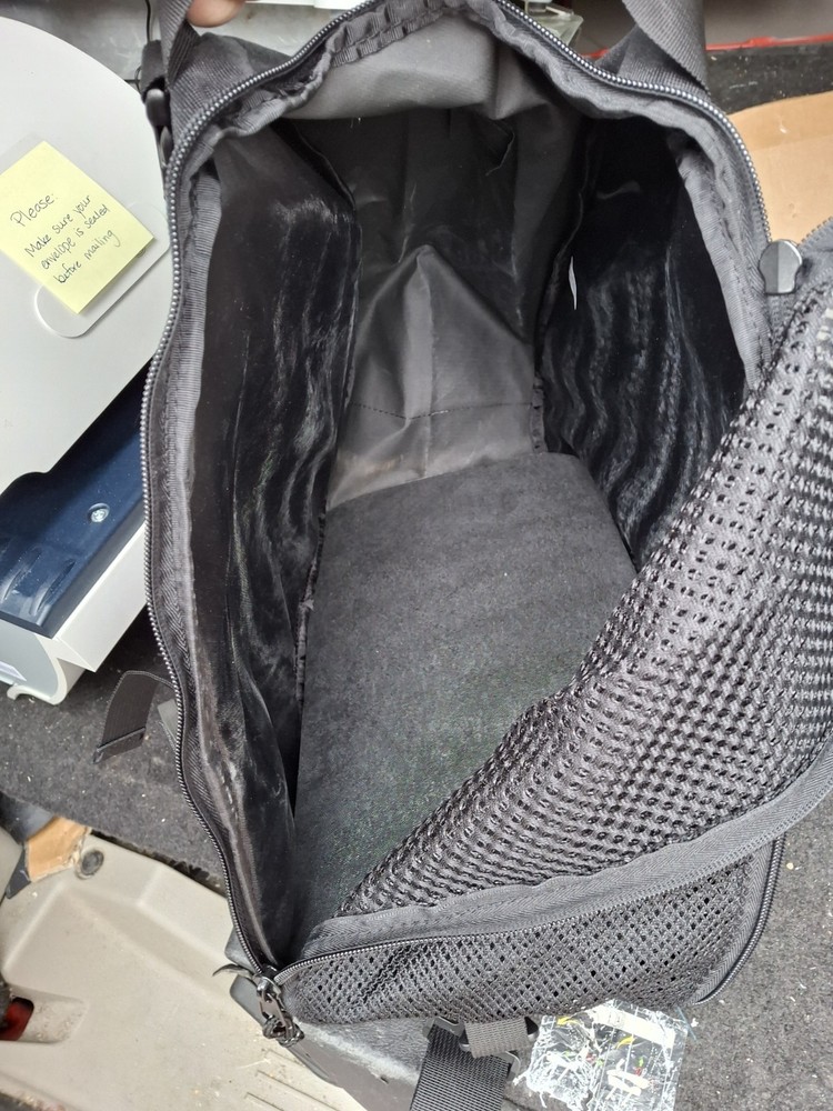 K2 Small Triangular Backpack Has A Insert To Make A Floor Maybe A Pet Carrier