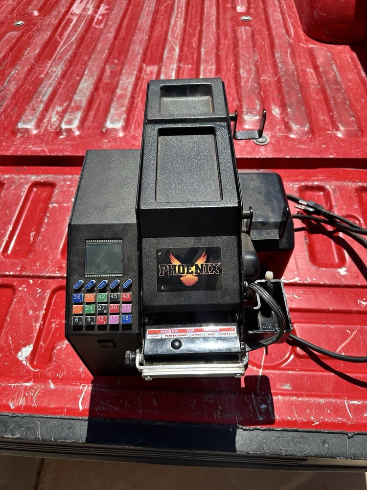 PHOENIX E-4 ELECTRONIC AUTOMATIC GUMMED PAPER PACKAGING TAPE DISPENSER.