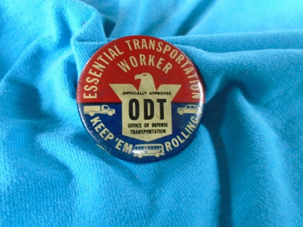Essential Transportation worker pin back button, KEEP EM ROLLING