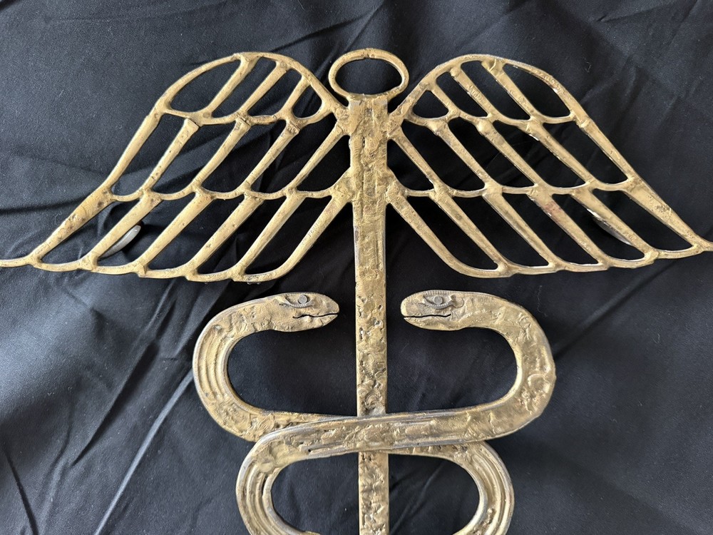 Caduceus metal wall mount