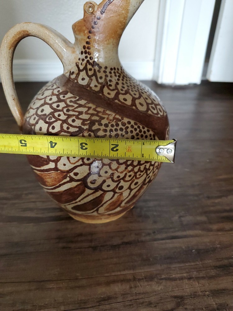 Amazing Pottery Pitcher Signed SF