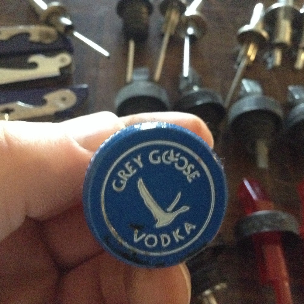 Assorted bar pour spouts, caps and openers
