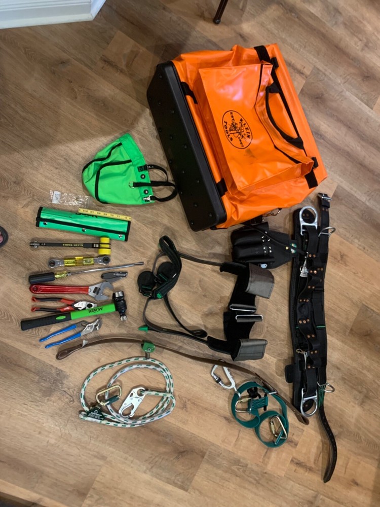 lineman climbing gear, large belt, lineman tools, spike sharpener