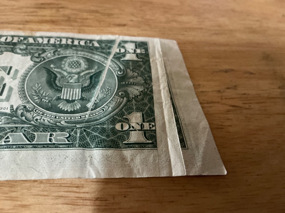 $1 1977 L series "DOUBLE GUTTER FOLD, misaligned errors. RARE