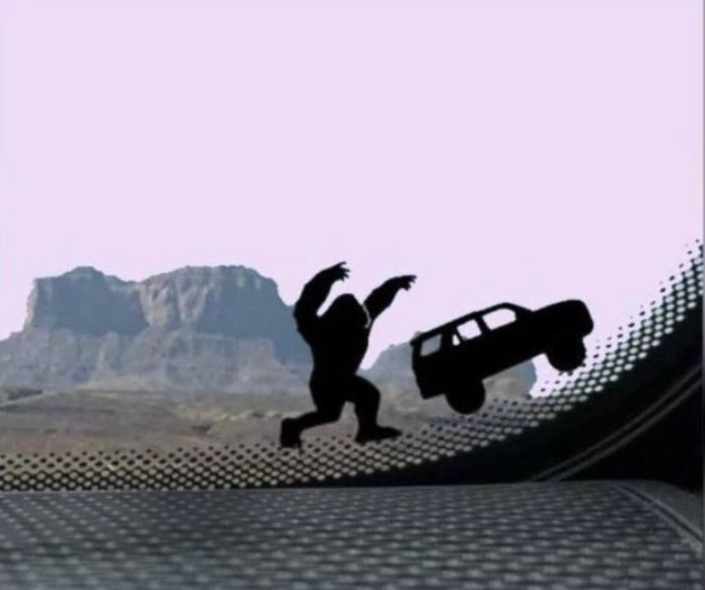 Tiny Bigfoot Chasing SUV Car Decal