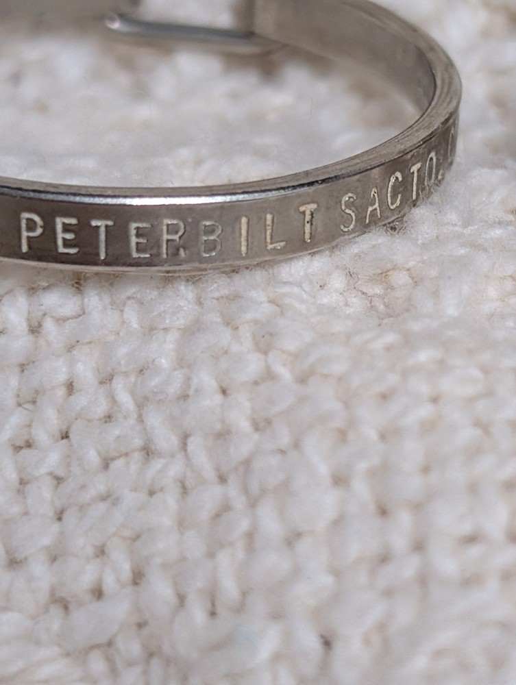 # 660 2 Vtg Peterbilt Advertisement Key Chain Ring