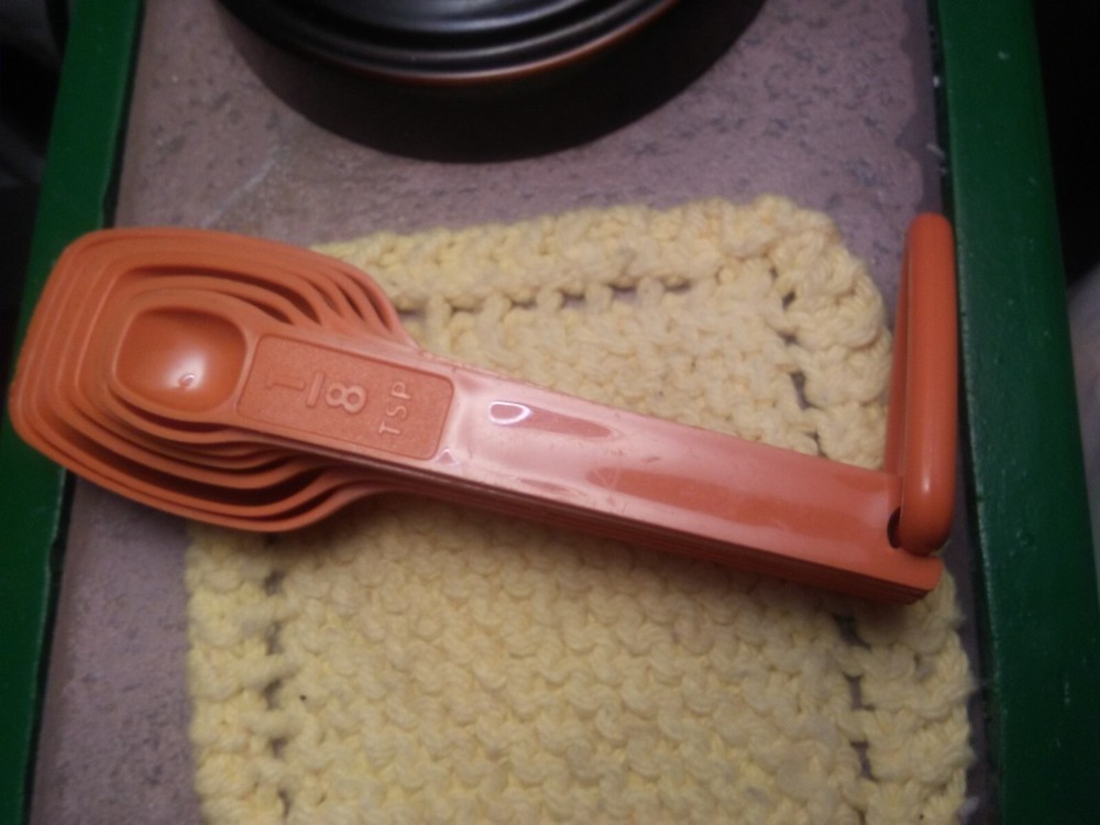 vintage Tupperware measuring spoons burnt orange