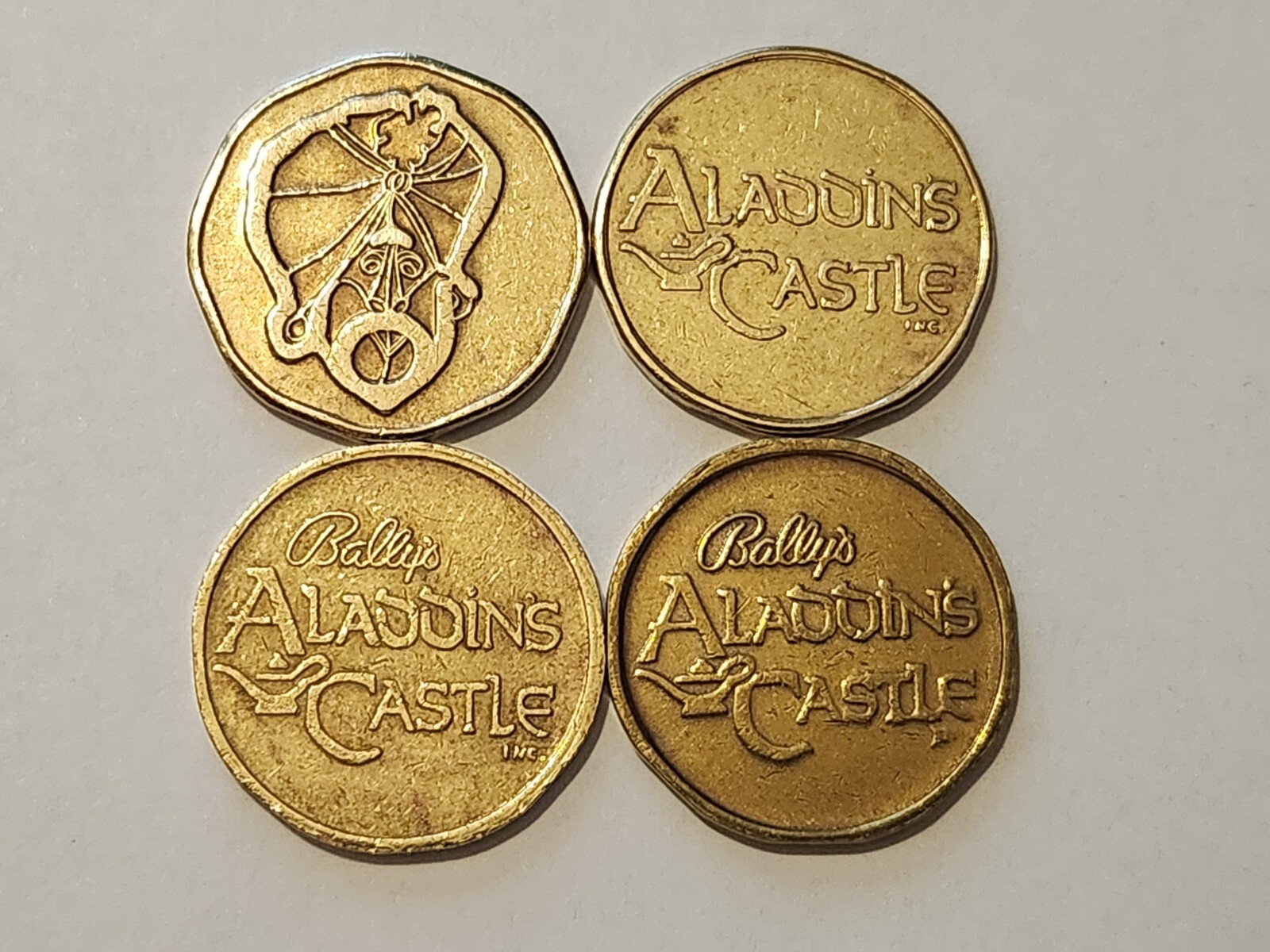 ALADDIN'S CASTLE - 4 DIFFERENT ARCADE TOKENS - GENIE/CASTLE, ALADDIN'S LAMP