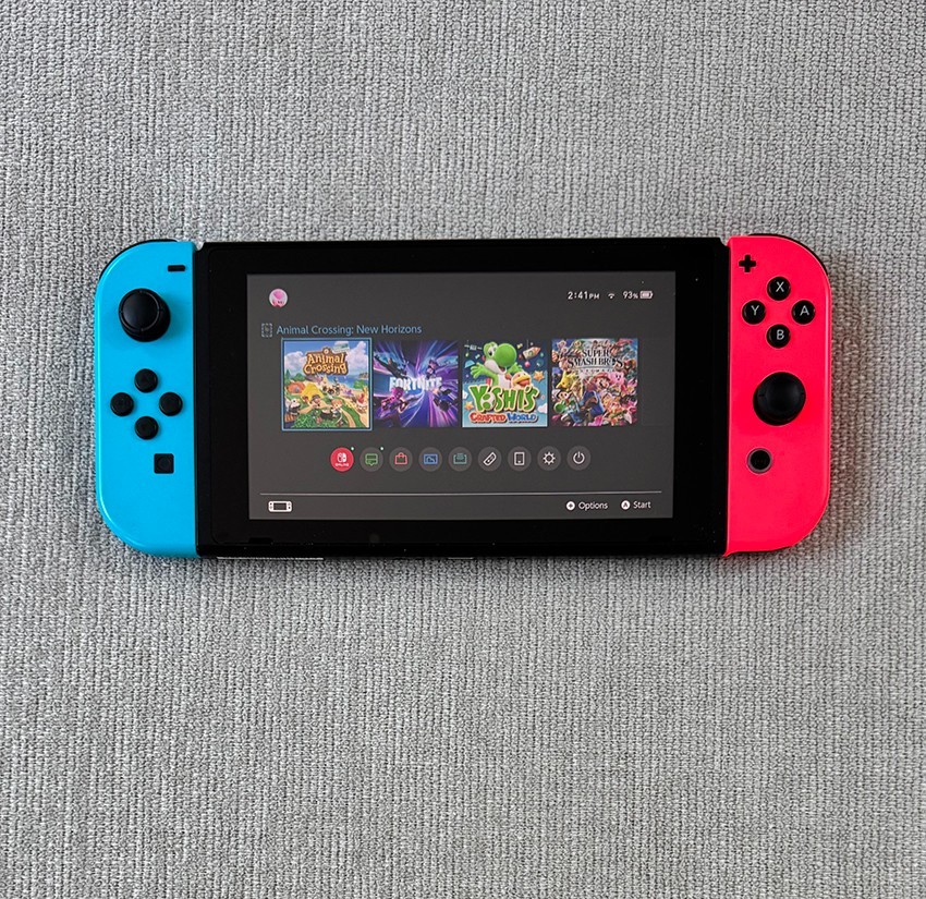 Nintendo Switch Console Plus Neon Red and Neon Blue Joy-Con set