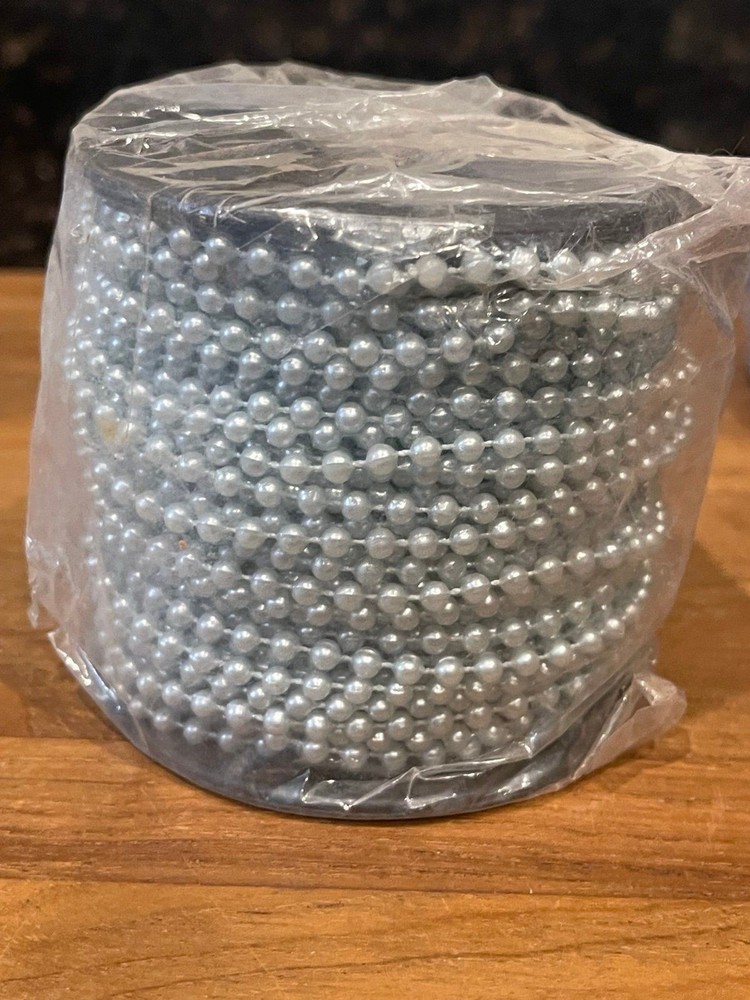 5 rolls of plastic string beads