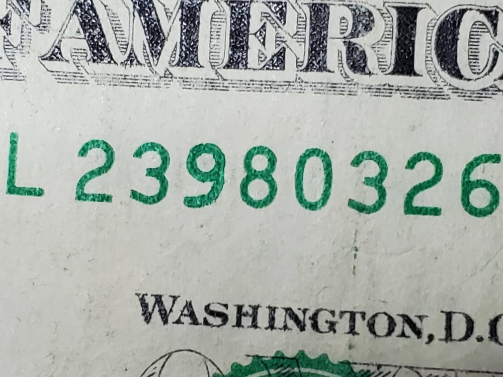2013 One Dollar Note Over Inked Serial Number, "9"