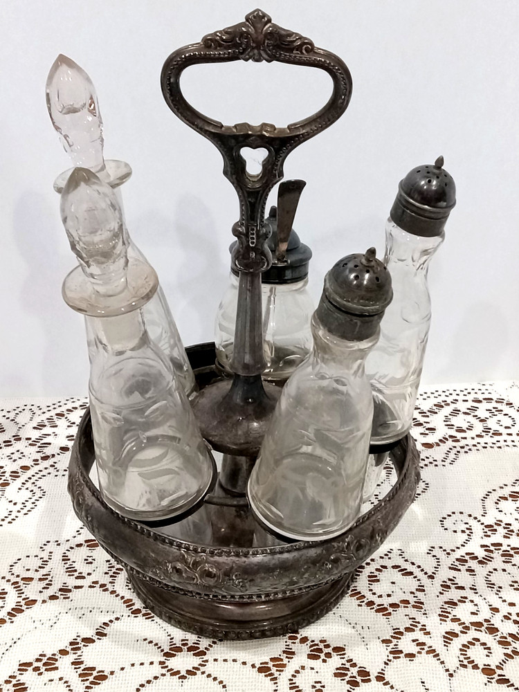 Victorian Condiment Castor Caddy 5 bottles plus two extras Silver Plate Etched