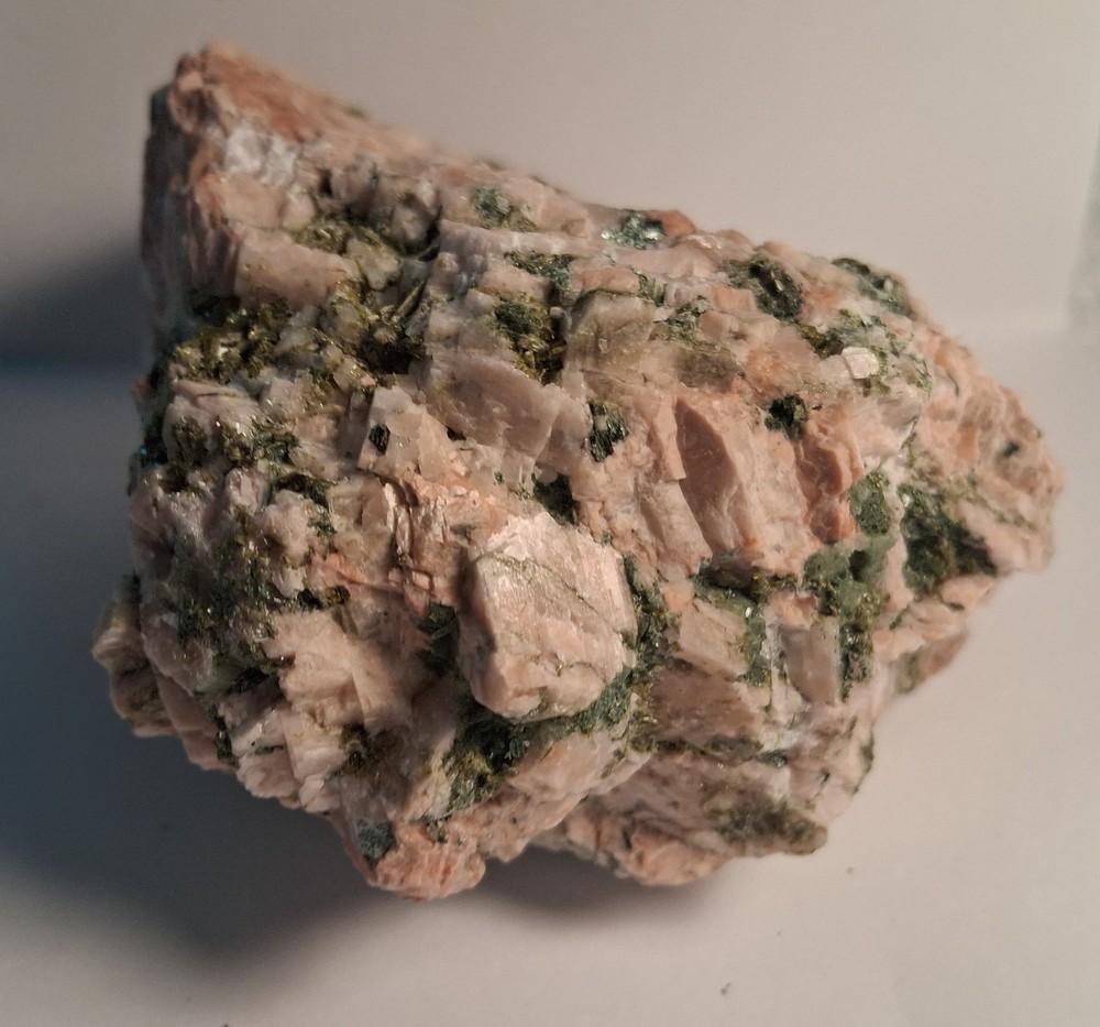 Epidote crystals in Granite Pegmatite display specimen