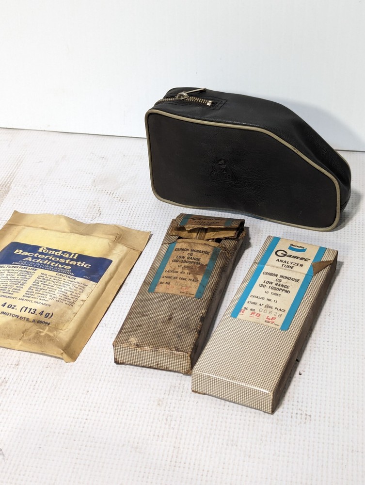 Drager gas detection test pump with case and analyzer tubes as pictured