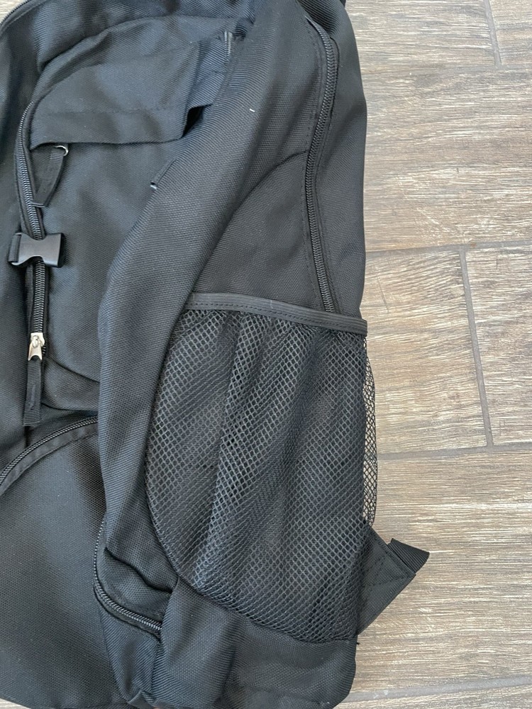 IRONMAN Triathlons, Backpack, Non Race Specific. Features The M-Dot Logo