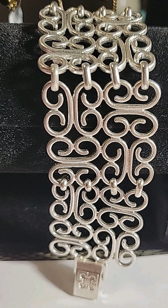Silvertone Signed With Symbol  7" Design Bracelet  Retro