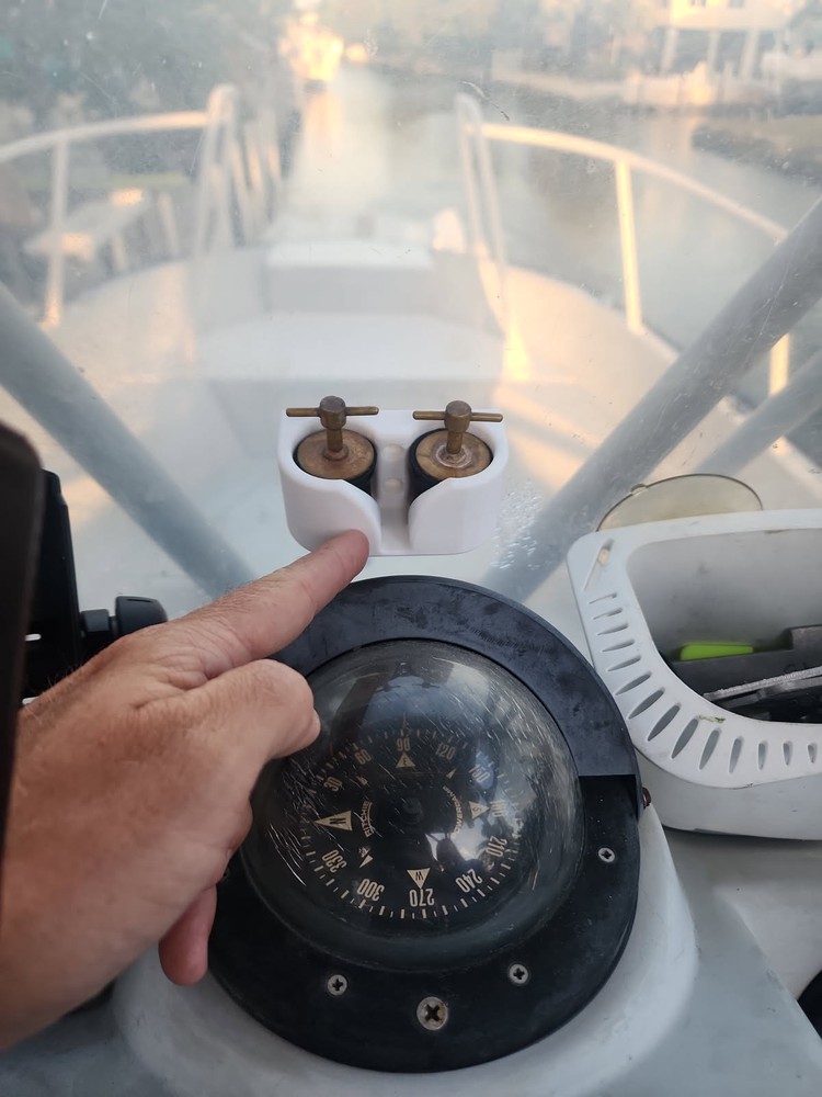 Scupper plug holder