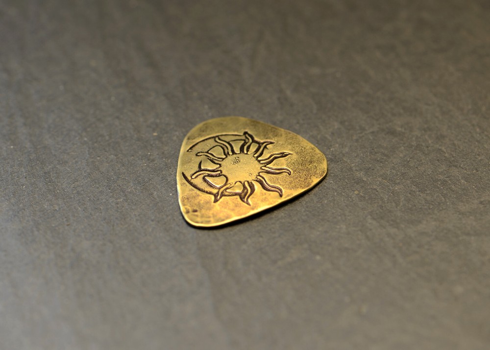 Sun and Moon playable brass guitar pick