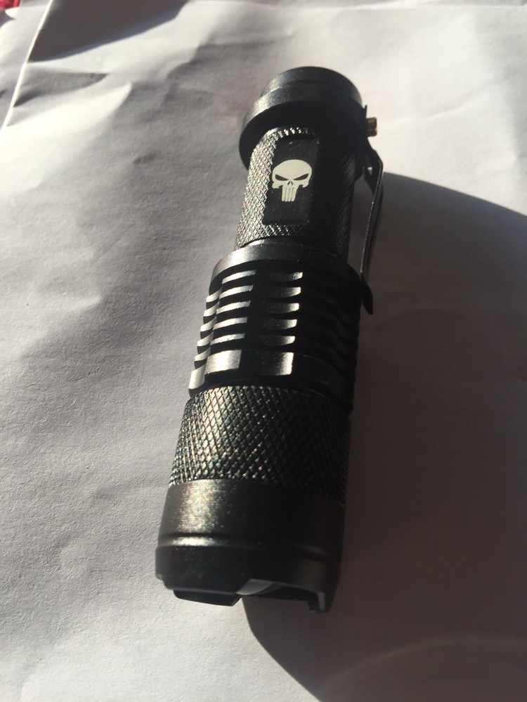 tactical flashlight w/skull logo 