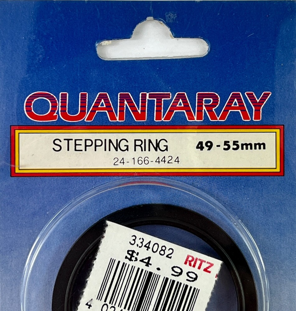 NEW - Quantaray Stepping Ring 49-55MM LC44
