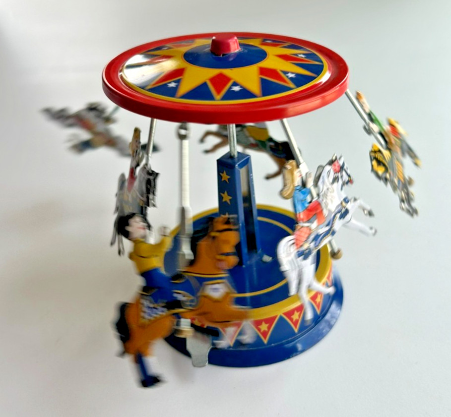 Schylling Pull & Spin Carousel Tin Toy 4" x 3"