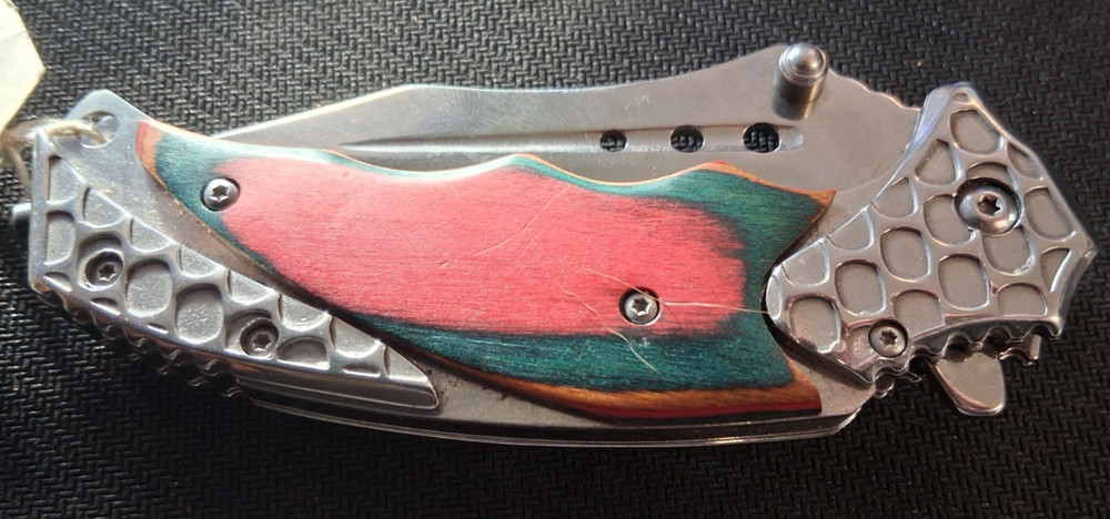 The Bone Edge Damascus Folding Knife