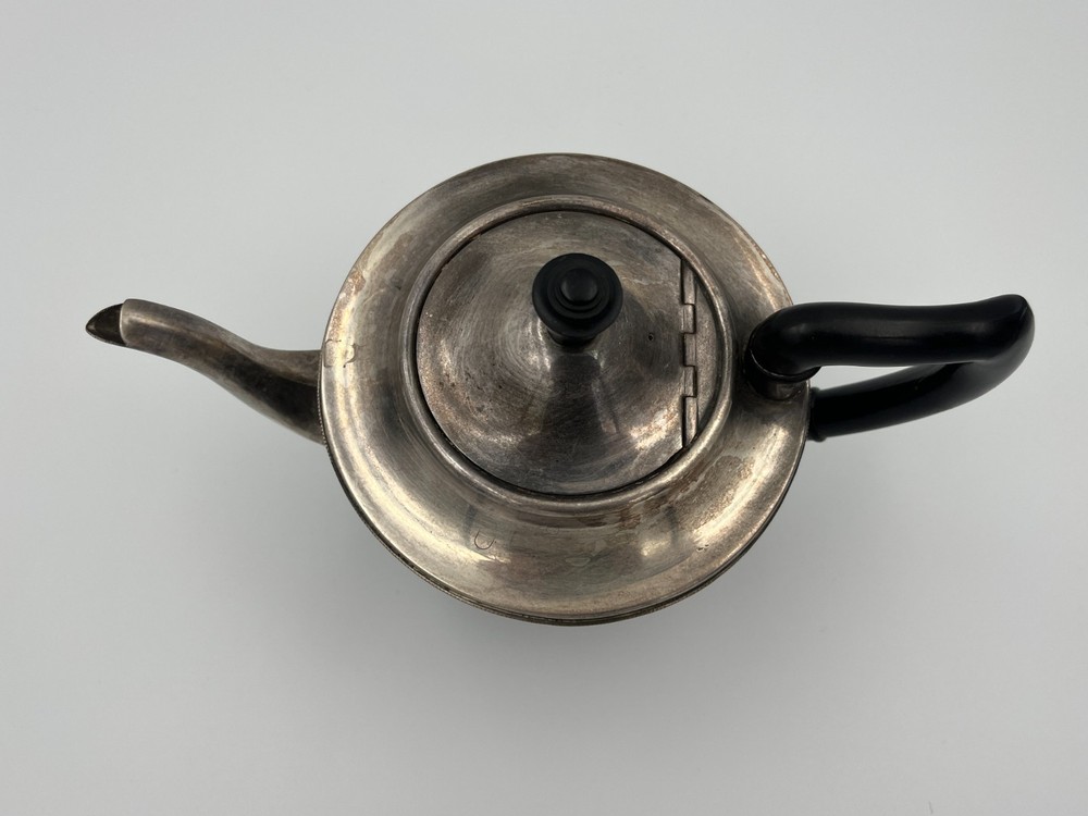 Antique silver plated teapot.