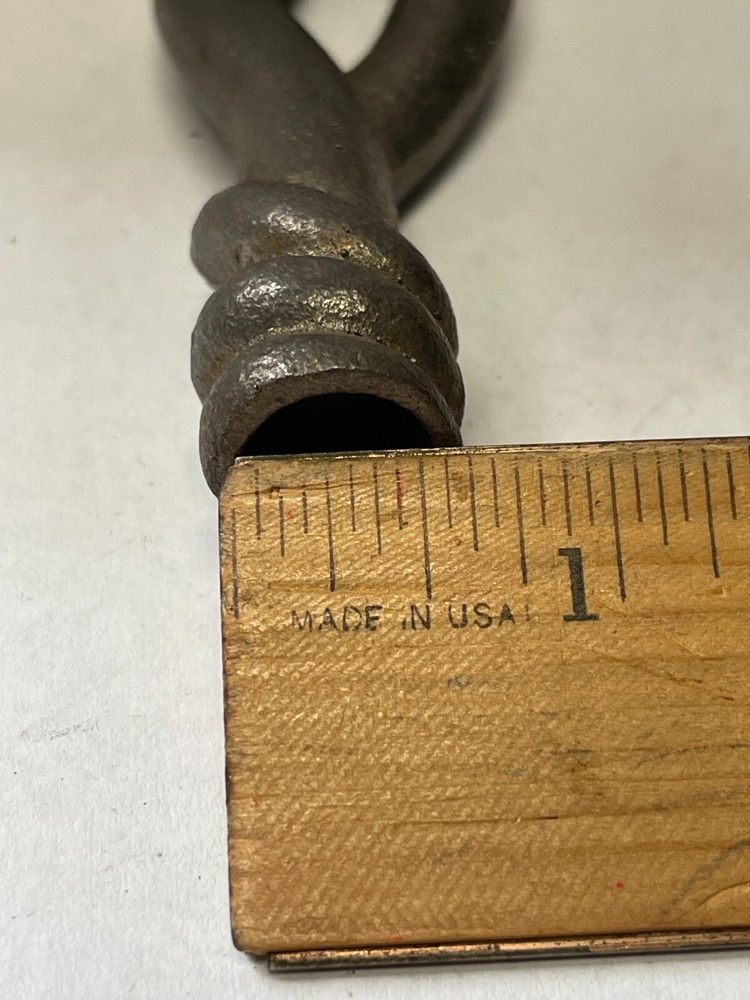 Handles for fireplace tools, Cast iron