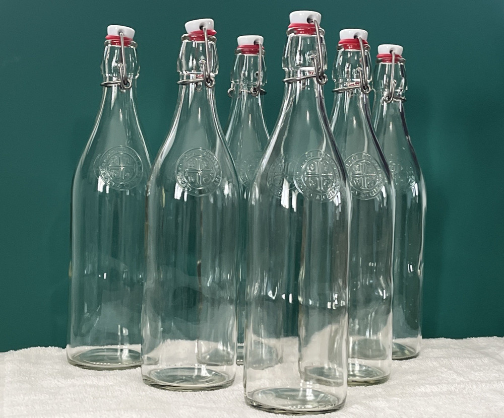 Six Empty Wine Bottles With Stoppers Clear Glass