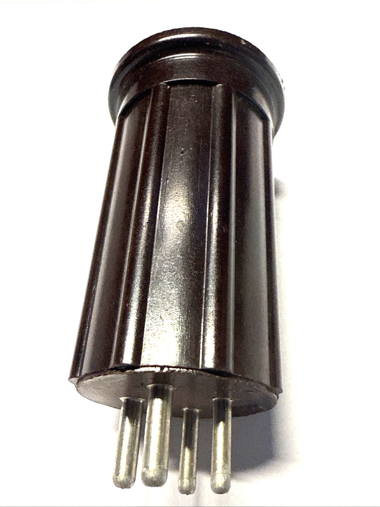 4 pin  plug-in coil form by BUD  USED DARK BROWN
