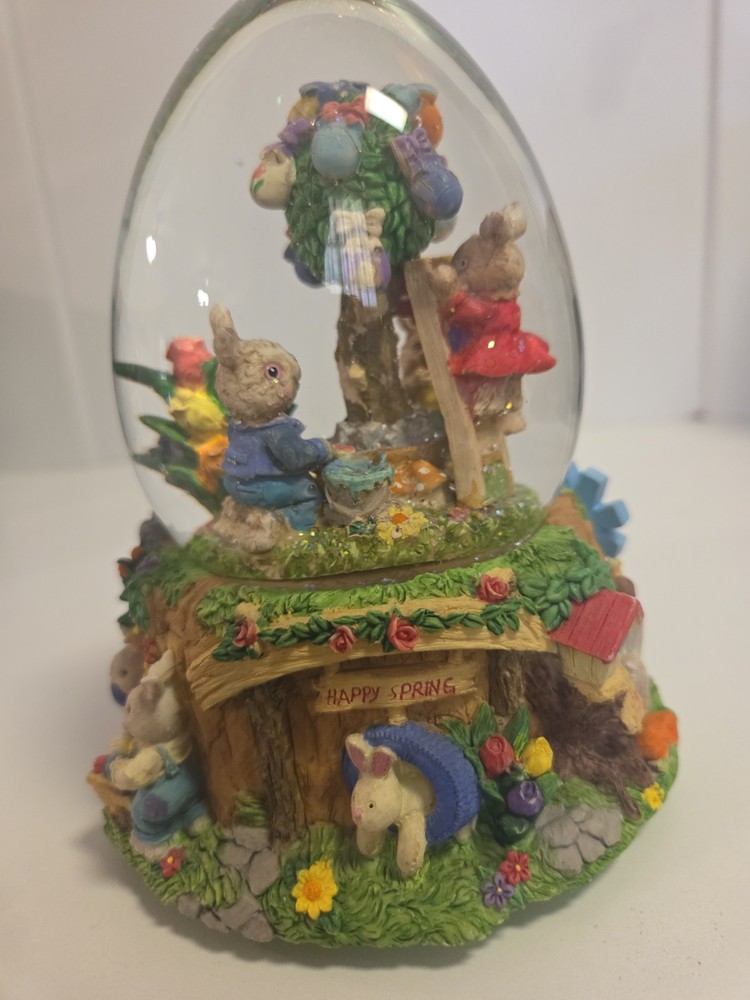 Springtime/Easter musical egg shaped glitter globe plays "Easter Parade"